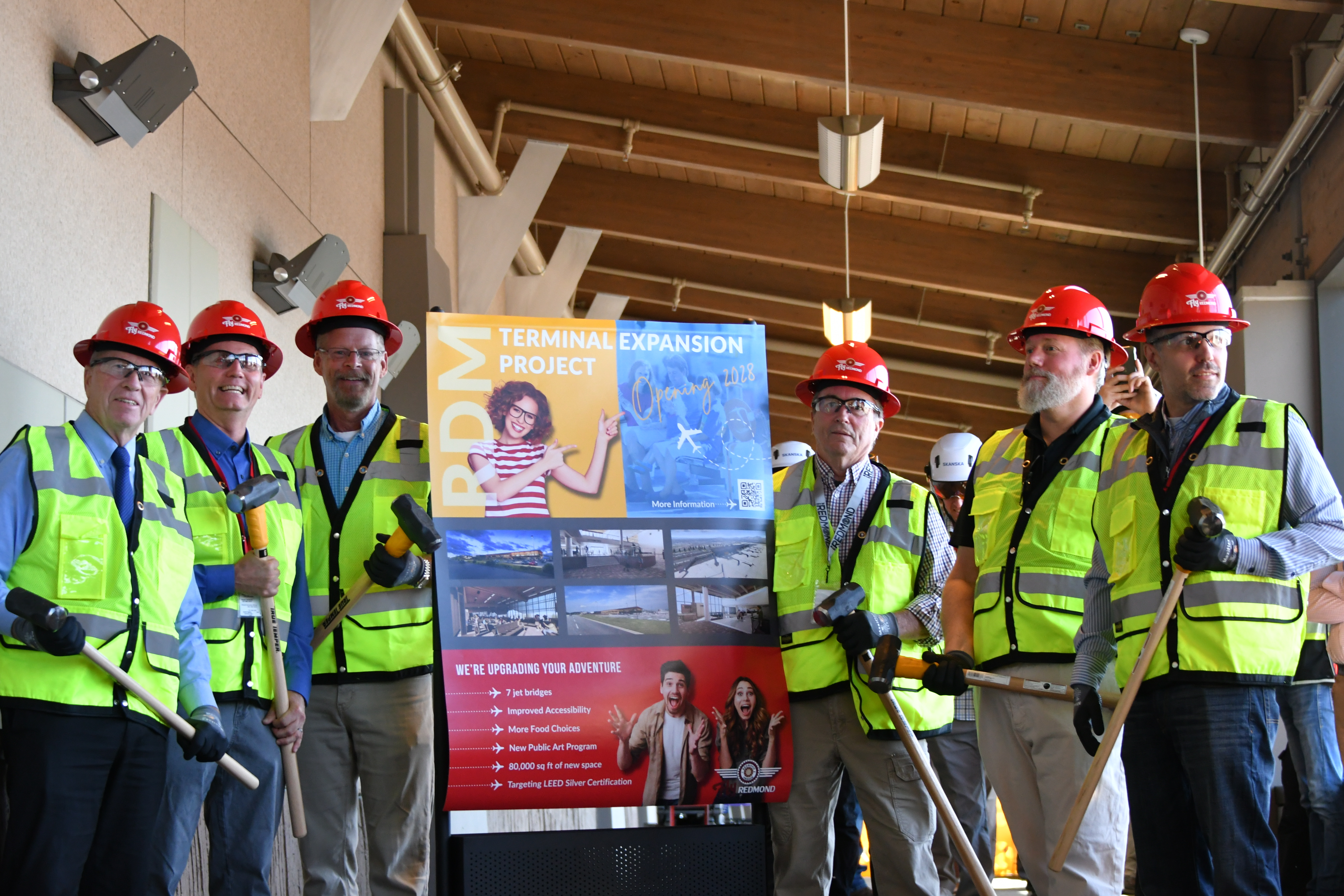 RDM groundbreaking demolition event. Photo from left to right: Mayor Ed Fitch, Airport Engineer - Fred LeLacheur, Airport Committee Member Eric Sande, Council Members John Nielsen and Jay Patrick, and Airport Director Zachary Bass.